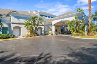 More Details about MLS # TB8502903 : 8303 PALM PARKWAY UNIT 207